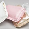 Frilly clutch